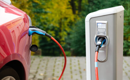 Close up of a charging electric car