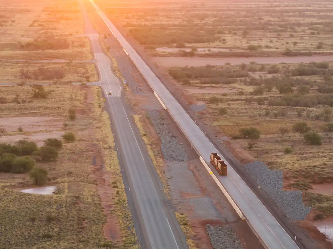 Auto road train travels on sealed, fenced haul road from Ken’s Bore to Port of Ashburton.