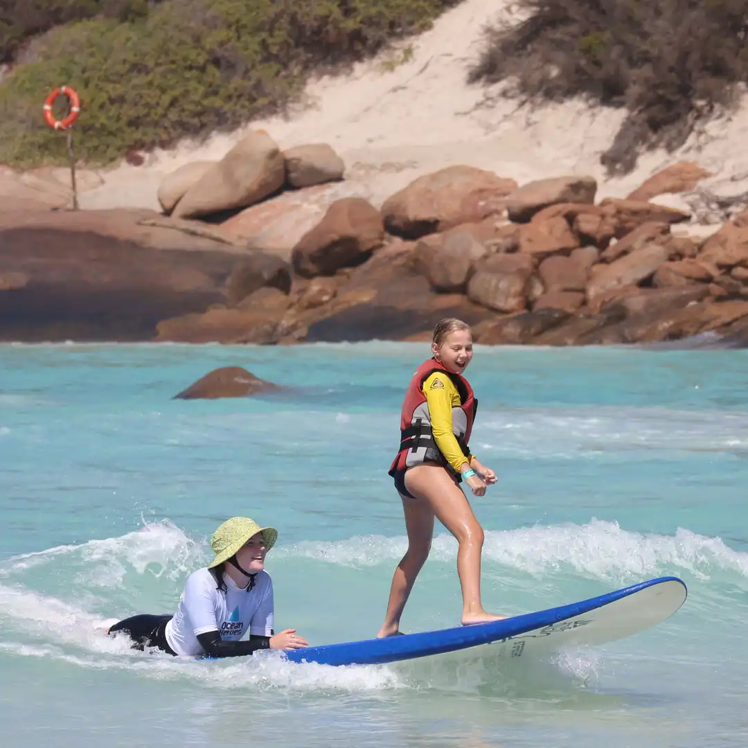 Girl on a surfboard in the ocean
